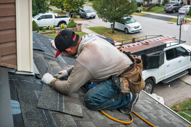 Professional Emergency Roof Repair technician working in Huntingtown, MD